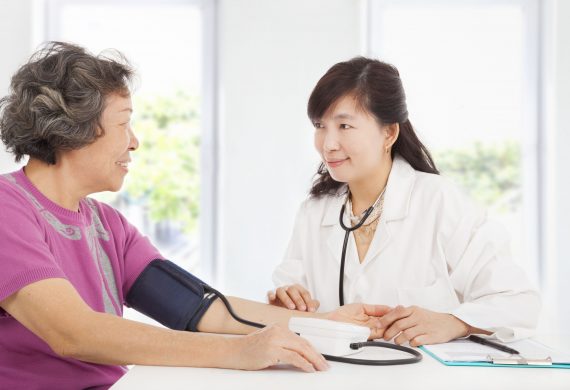 Elderly lady consulting a doctor