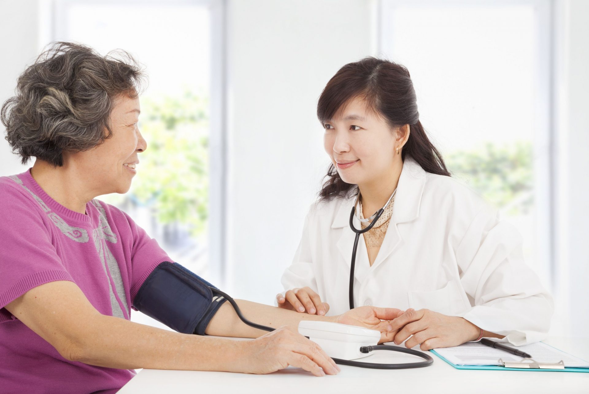 Elderly lady consulting a doctor