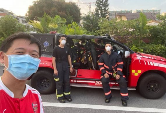 Community first-responder Dr Ng and SCDF