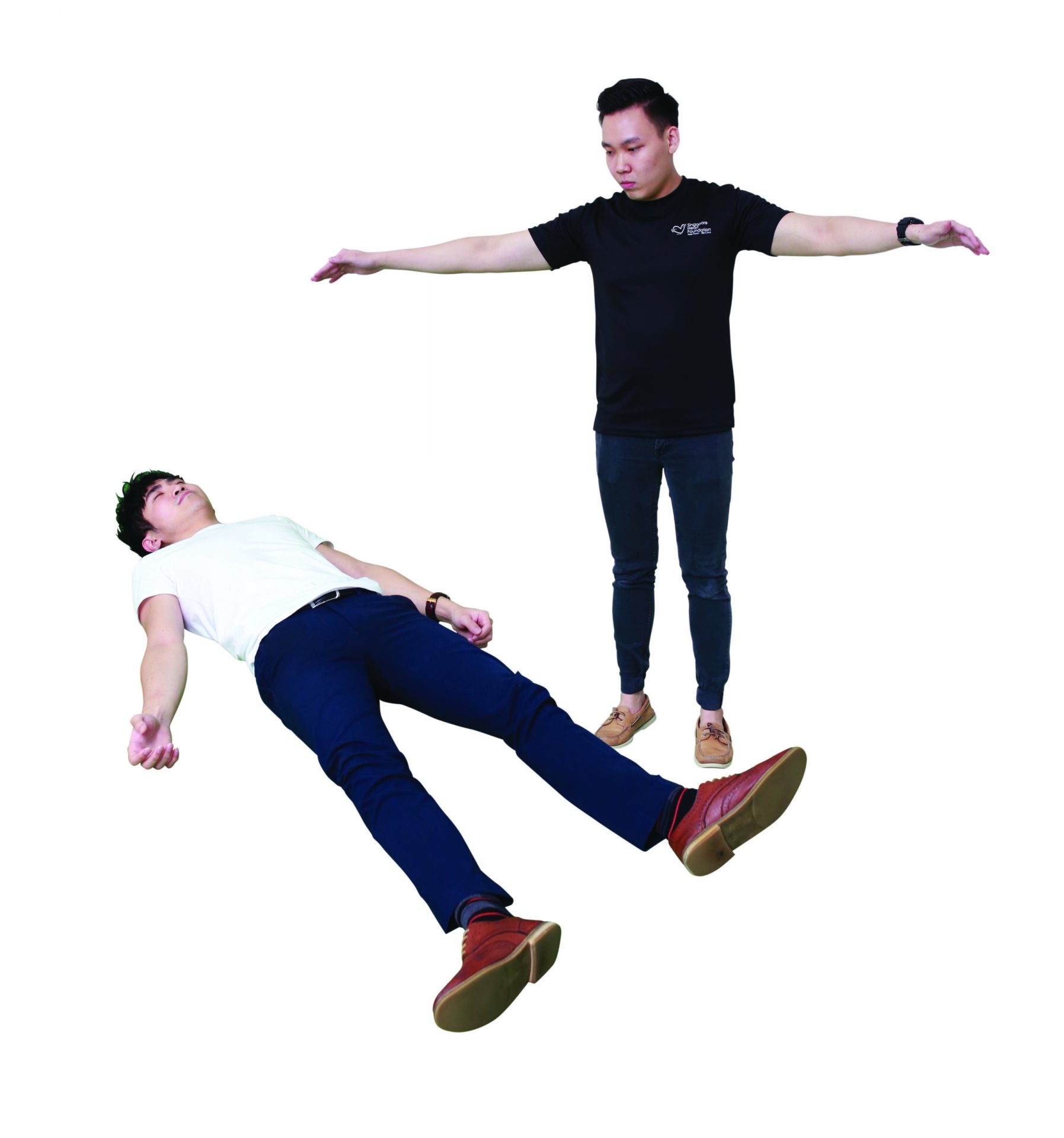 Person checking for danger before approaching casualty