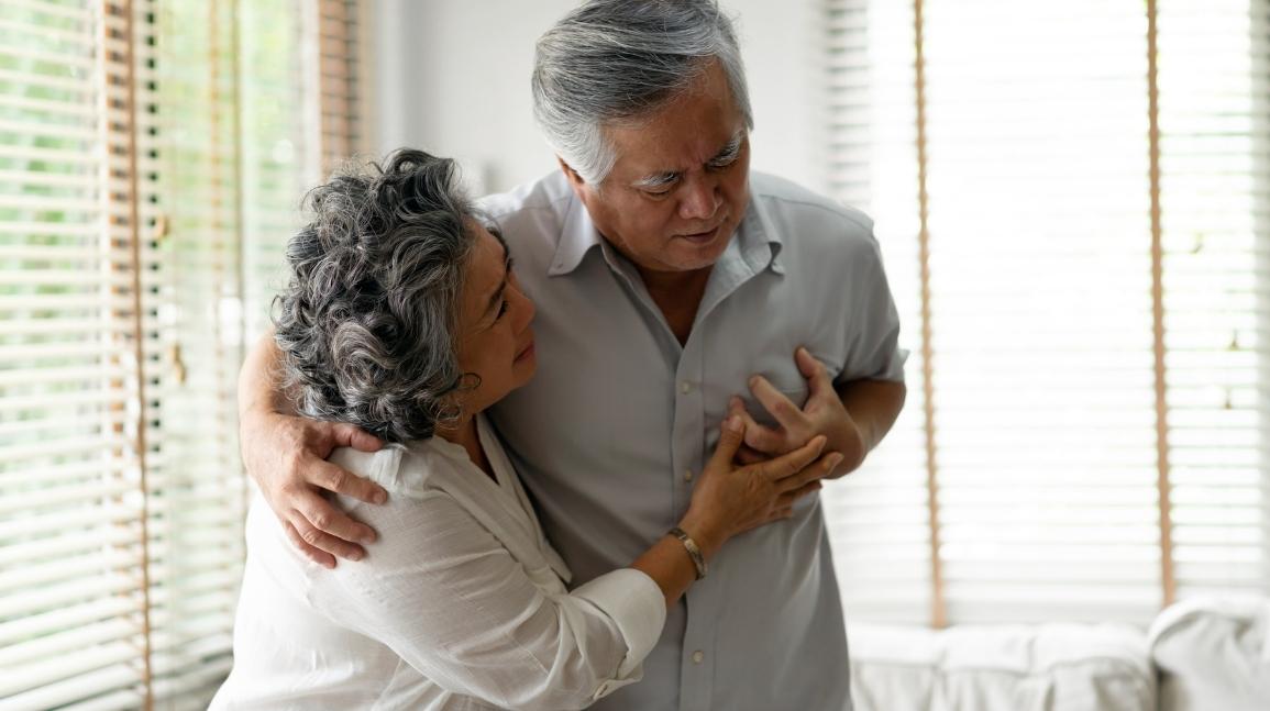 Elderly man having chest pains