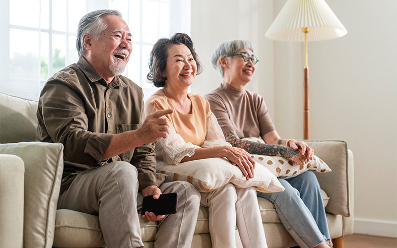 Active Singapore seniors enjoying a social activity to combat malnutrition.
