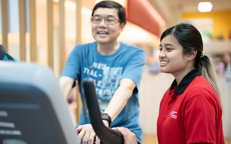 Man having a rehab session with a physiotherapist