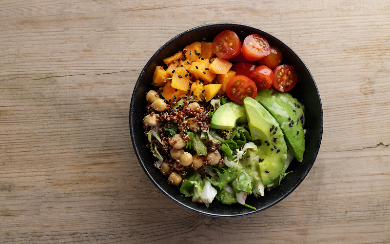 Healthy nutrient-dense salad bowl supporting metabolic liver health.