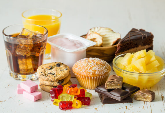 Assorted sweet snacks and desserts on table.